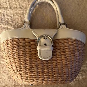 Vintage Coach straw and white leather handbag.